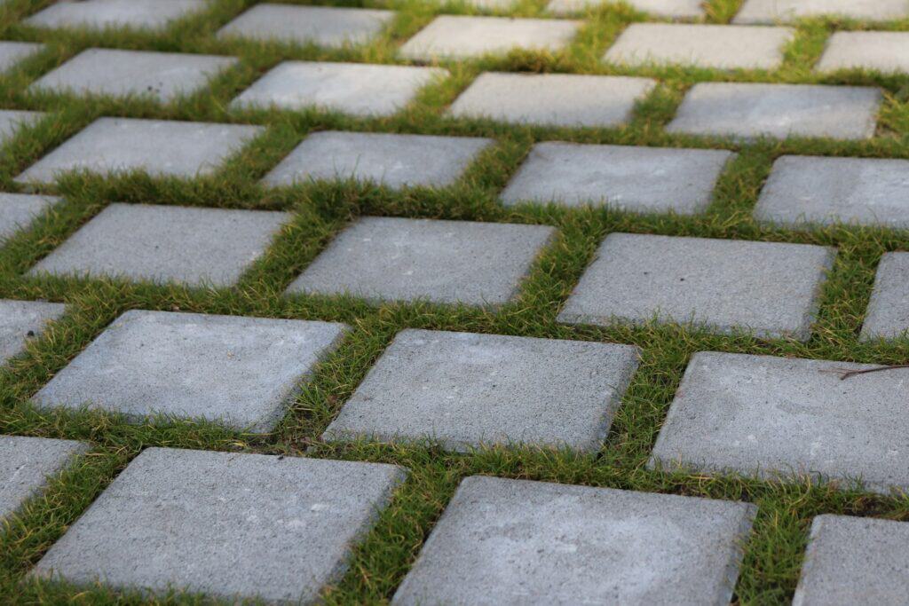 Grey brick pavement, the kind of paving used on driveways, patios and public spaces